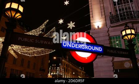London, UK - 11/25/2018: Characteristic sign above entrance to station of rapid transit system London Underground (subway, also The Tube). Stock Photo