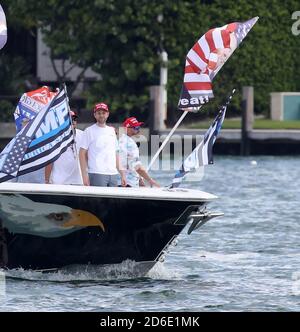 Miami, FL, USA. 15th Oct, 2020. Hundreds of boats showed up for a massive show of support even in the pouring rain as the President's son Eric Trump and wife Lara lead a pro-Trump Flotilla rally in Miami, Florida on October 15, 2020 just 19 days ahead of the election the turnout was massive and was in the pouring rain Credit: Hoo Me/Media Punch/Alamy Live News Stock Photo