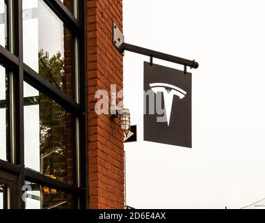 Signage outside the Tesla Motors showroom and service center in the Red Hook neighborhood of Brooklyn in New York, seen on Saturday, October 10, 2020. (© Richard B. Levine) Stock Photo