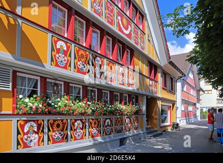 Typical brightly painted house Restaurant Sonne in the center of the village, Appenzell, Appenzeller Land, Canton of Appenzell-Innerrhoden, Switzerland Stock Photo