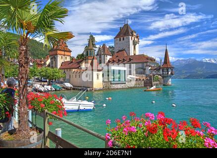 Oberhofen Castle on the lakeshore, Oberhofen, Lake Thun, Bernese Oberland, Canton of Bern, Switzerland Stock Photo