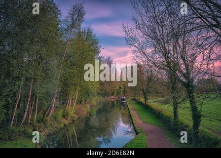 A tranquil spring morning along the Birmingham and Fazeley Canal near Drayton in Staffordshire, UK Stock Photo