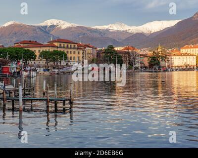 panoramic view of lake Lugano and mountains covered with snow in a sunny afternoon .Lugano,Canton Ticino,Switzerland Stock Photo