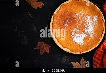 American Pumpkin Pie. Thanksgiving Day. American cuisine. Top view. Stock Photo