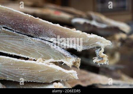 Salted and dried cod being sold at local grocery shop Stock Photo