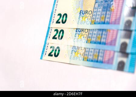 Three 20 euro bills on white back ground Stock Photo