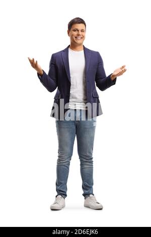 Full length portrait of a happy young man in jeans and suit gesturing with hands isolated on white background Stock Photo