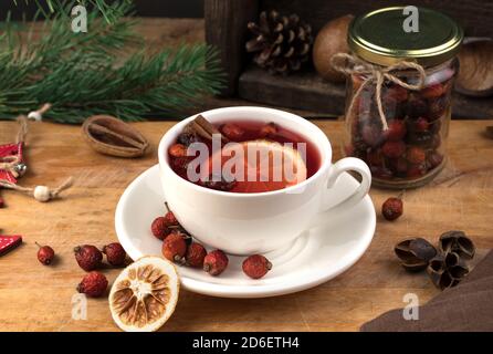 White tea Cup with lemon on Christmas background. Stock Photo