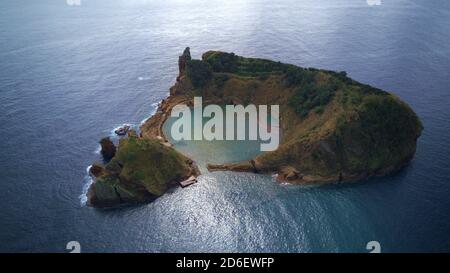 drone shot of volcano island on azores Ilhéu Vila Franca do Campo Stock Photo