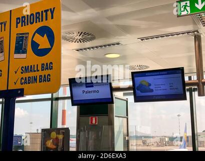 Ferno, Milan-Malpensa, Italy - September 23, 2020: Scoreboard at low cost airline company Ryanair for Palermo flight inside the Milan-Malpensa airport Stock Photo