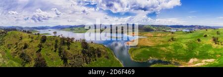 Beautiful Lake Windamere on Cudgegong river above dam in hill ranges of Australian Central West NSW - Aerial panorama. Stock Photo