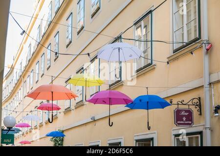 The Sünnhof-Passage with colorful umbrellas, passage and Biedermeier inner courtyard between Landstrasser Hauptstrasse and Ungargasse, 3rd district, Landstrasse, Vienna, Austria Stock Photo