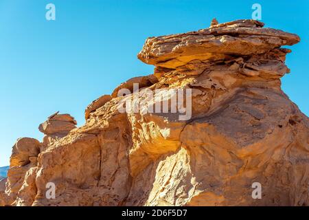 Rock formation due to wind erosion in the siloli desert, Eduardo Avaroa national reserve, Bolivia. Stock Photo