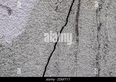Detailed close up view on aged concrete walls with cracks and lots of structured details Stock Photo