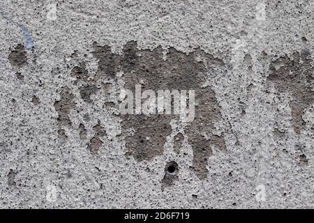 Detailed close up view on aged concrete walls with cracks and lots of structured details Stock Photo