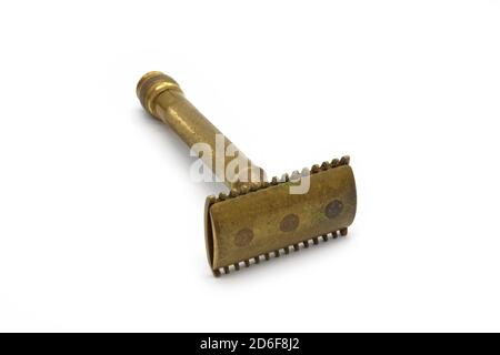 Antique three-piece  portable travel shaving set, isolated on white background. Stock Photo