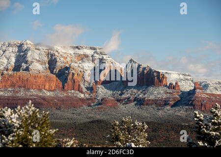 View of snow covered Steamboat Rock in Sedona Arizona Stock Photo