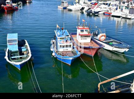 Porto do Son, Spain. July 3, 2020. Old wooden galician fishing vessels moored in a harbor at famous Rias Baixas region. Coruña Province, Galicia. Stock Photo