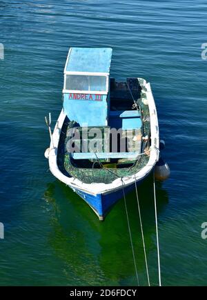 Porto do Son, Spain. July 3, 2020. Old wooden galician fishing vessel moored in a harbor at famous Rias Baixas region. Coruña Province, Galicia. Stock Photo