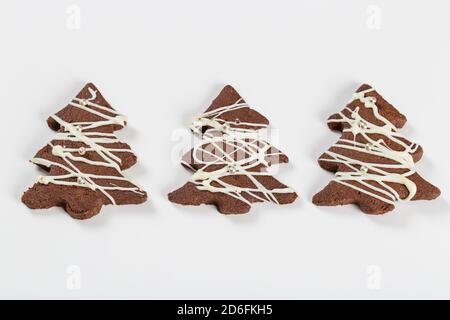 Buckwheat Christmas tree cookies coated with white chocolate Stock Photo