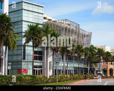 SOUTH BEACH, MIAMI, FLORIDA - NOVEMBER 12, 2012: The beautiful modern exterior of the South Beach location of the luxury gym Equinox on Collins Ave. Stock Photo