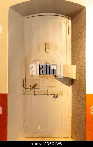 Close up of a prison cell door in a very old prison. Stock Photo