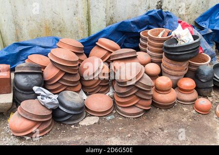 many clay pot make mud pottery on potters wheel. creating pots by shaping air  drying clay with both hands. mold with clay. practicing with modeling Stock  Photo - Alamy