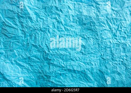 Crumpled paper texture. Twisted purple paper. Seamless pattern. Stock Photo