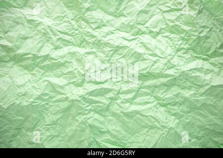 Crumpled paper texture. Twisted purple paper. Seamless pattern. Stock Photo