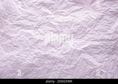 Crumpled paper texture. Twisted purple paper. Seamless pattern. Stock Photo