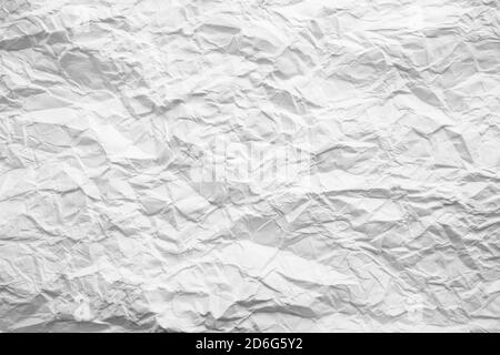 Crumpled paper texture. Twisted purple paper. Seamless pattern. Stock Photo