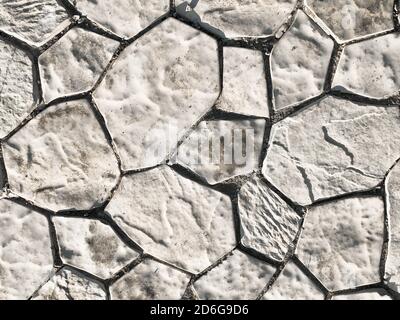 Bright gray stone background. Backdrop made of natural material. Textured surface Stock Photo