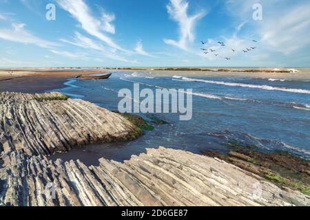 Amazing shape rocks on the sea coast Stock Photo