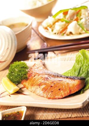 Japanese cuisine grilled salmon fish steak with rice, miso soup and vegetables Stock Photo
