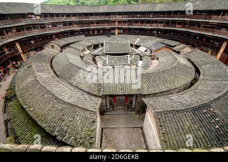 Interior of a round earth house (tulou) of the Hakka people, Yongding county, Fujian province, China Stock Photo