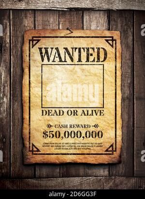 Wanted poster tacked on wooden wall background Stock Photo