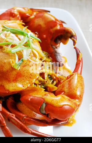 Stir fried curry crab on plate Stock Photo