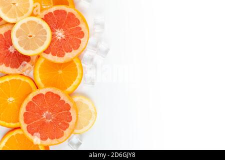 slices of grapefruit orange and lemon isolated on a white background with blank space for text Stock Photo