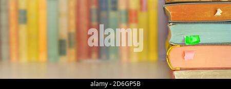Stack of books on book shelf. Reading,literature,education,library concept, panoramic large copy space Stock Photo