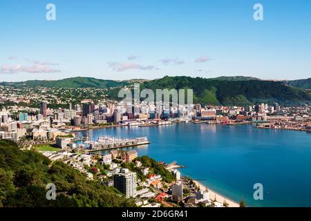 WELLINGTON, NEW ZEALAND - Feb 25, 2020: Elevated view of city buildings and harbour seen on a clear summer's morning as viewed from Mount Victoria. We Stock Photo