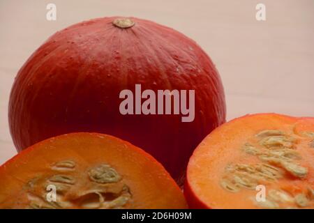 red hokaido close-up view with seeds and juicy pulp Stock Photo
