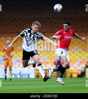 Port Vale's Nathan Smith (left) and Salford???s Ian Henderson battle for the ball during the Sky Bet League Two match at Vale Park, Stoke-on-Trent. Stock Photo