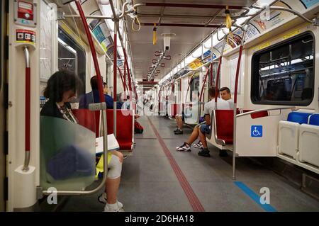 TORONTO, CANADA - 2016 06 27: Passengers in the cabin of TTC subway car. Toronto Transit Commission is a public transport agency that operates transit Stock Photo