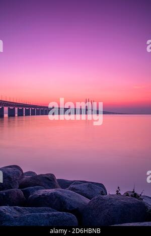 MALMO, SWEDEN - SEPTEMBER 20: The oresunds bridge that connects Sweden with Denmark at sunset. Stock Photo