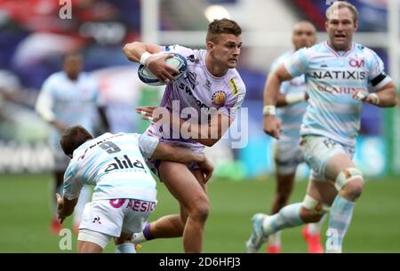 Exeter Chiefs' Henry Slade (left) is tackled by Racing 92's Teddy Iribaren during the European Champions Cup Final at Ashton Gate, Bristol. Stock Photo