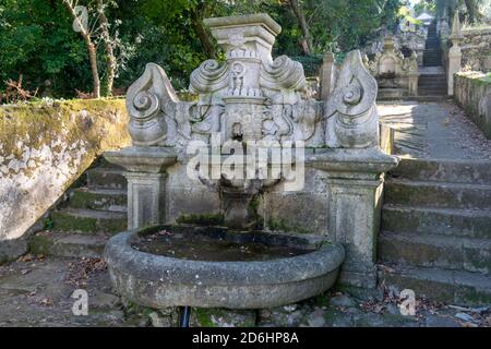 Baroque style fountain from Tibães Monastery aka Mosteiro de Tibães in Portugal Stock Photo