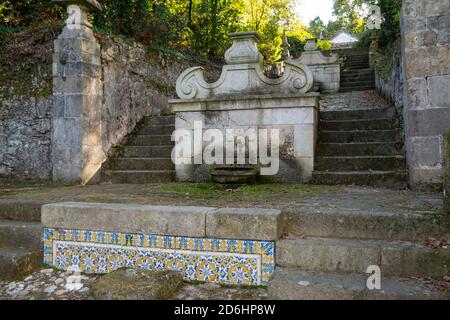 Baroque style fountain from Tibães Monastery aka Mosteiro de Tibães in Portugal Stock Photo