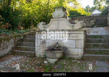 Baroque style fountain from Tibães Monastery aka Mosteiro de Tibães in Portugal Stock Photo