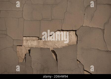 cracked wall background. Gray wall cracked. Grey Stock Photo