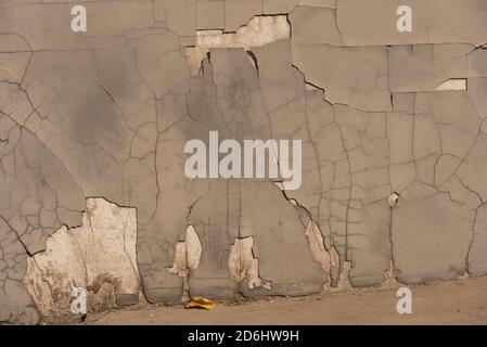cracked wall background. Gray wall cracked. Grey Stock Photo